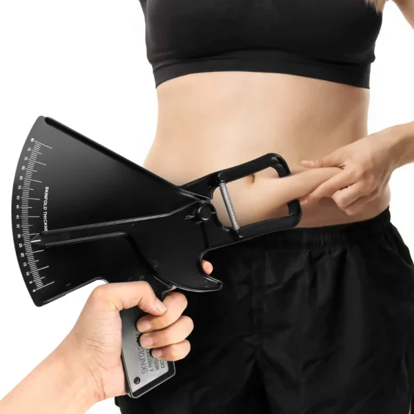 Skinfold body fat caliper measuring abdominal fat